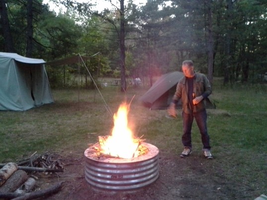 Feral lights a fire with extra virgin cooking oil.