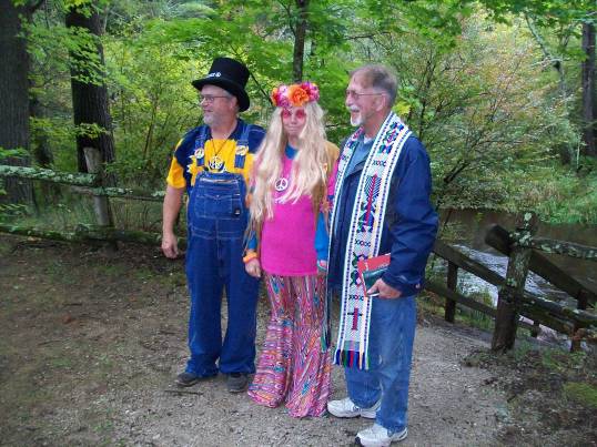 George, Deb, and Father Ron Schneider
